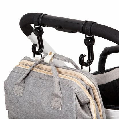 Ganci rotanti per passeggino agganciati al telaio con borsa appesa