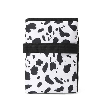 Fasciatoio portatile pieghevole impermeabile variante bianco e nero chiuso 