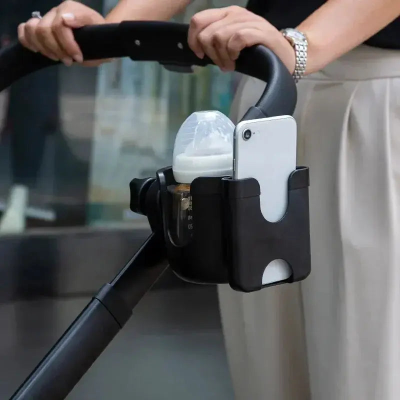 Organizzatore passeggino nero in plastica con bottiglia e smartphone