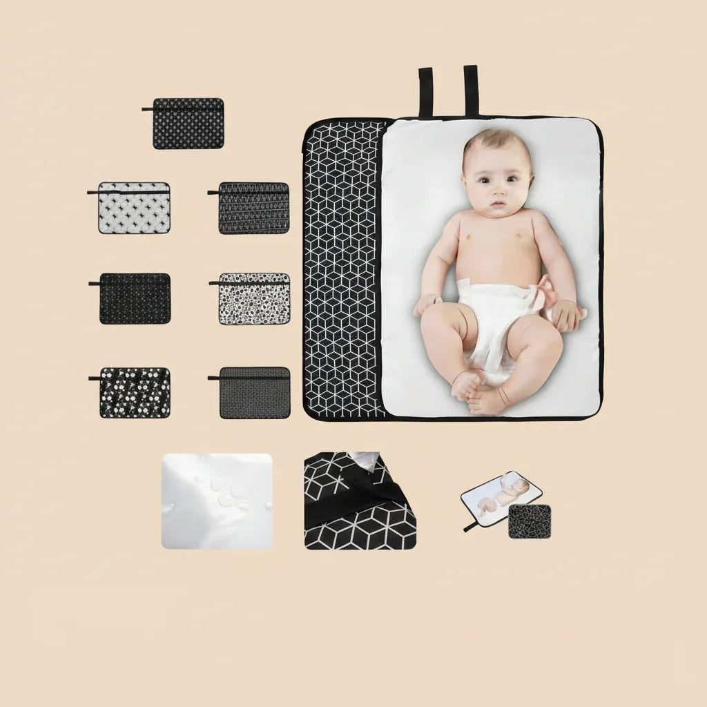Fasciatoio portatile pieghevole aperto con neonato e varianti colore disponibili